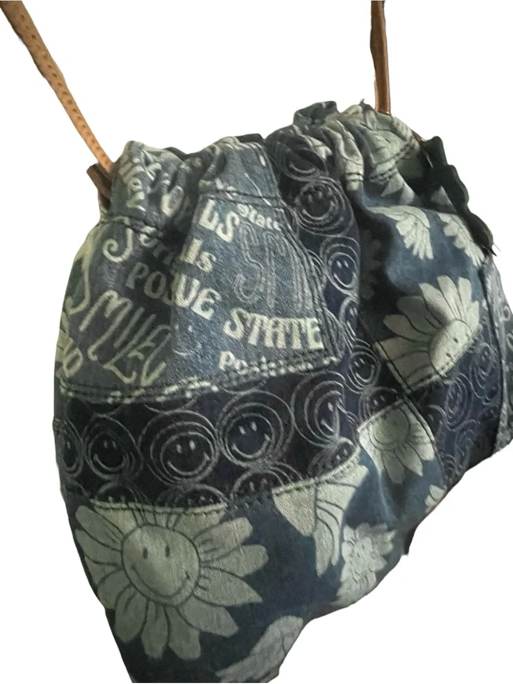 Fossil x Smiley limited edition patchwork denim drawstring shoulder bag.